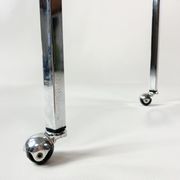 Table on wheels, laminate top and metal Eiffel legs, circa 1950