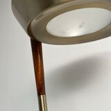 Golden metal floor lamp with reading light