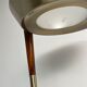 Golden metal floor lamp with reading light