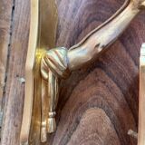 Pair of bronze wall sconces with outstretched arms and hands