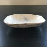 Empty blue speckled white pocket