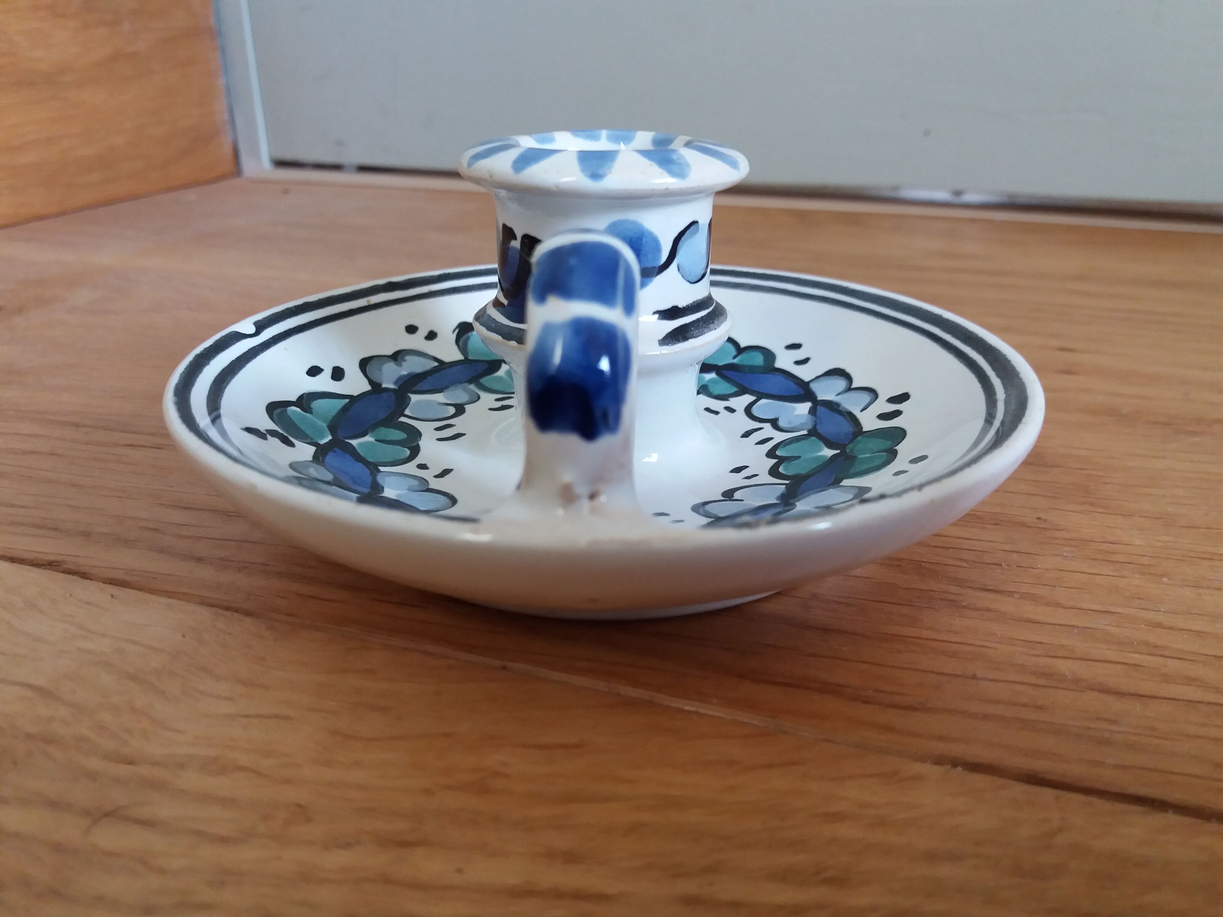 Cellar rat candle holder