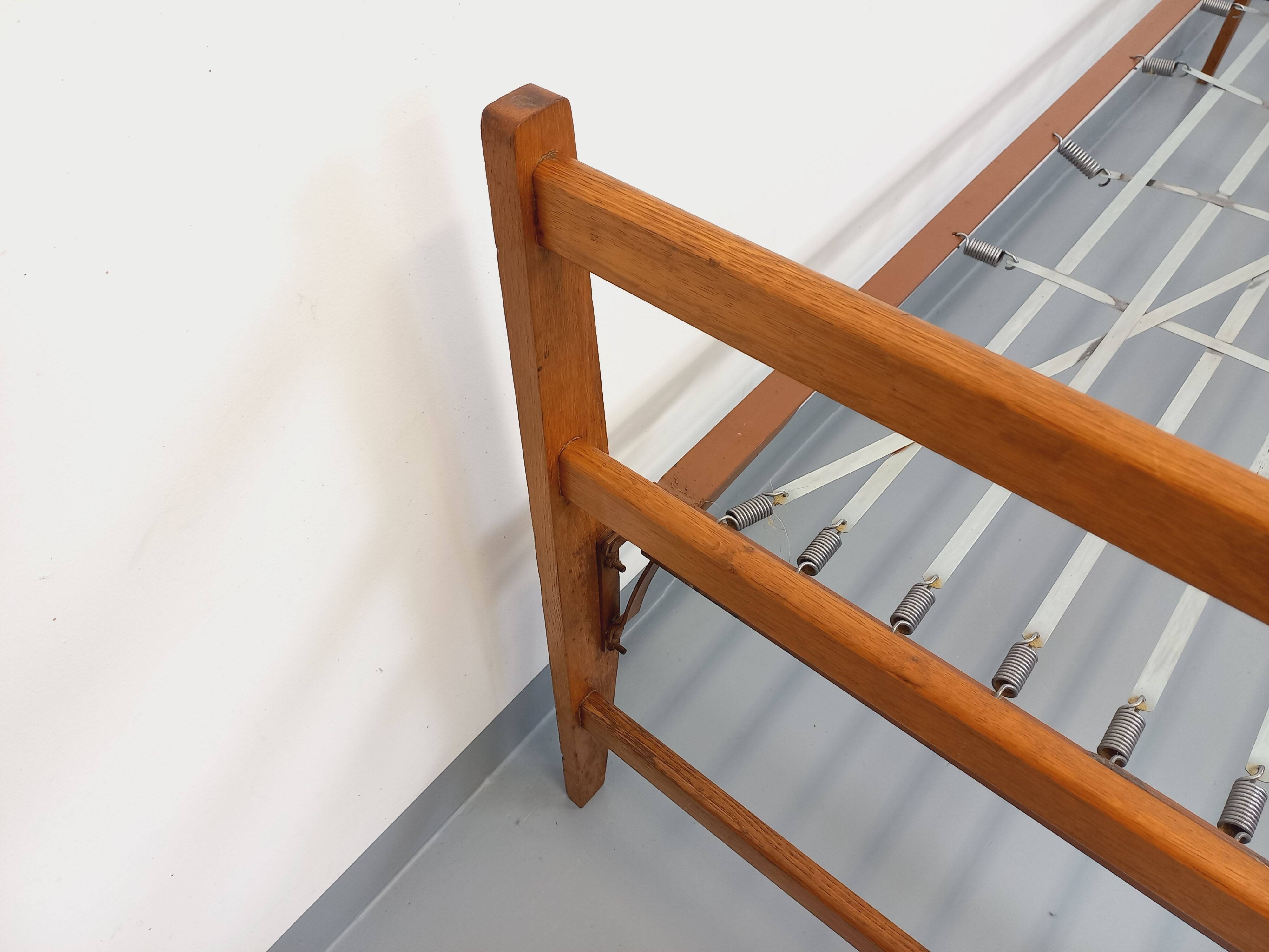 Pair of vintage stackable daybeds in oak wood and metal from the 60s