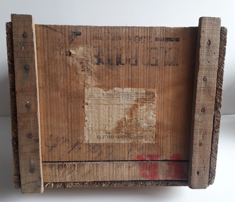 Ibled chocolate box in old wooden transport