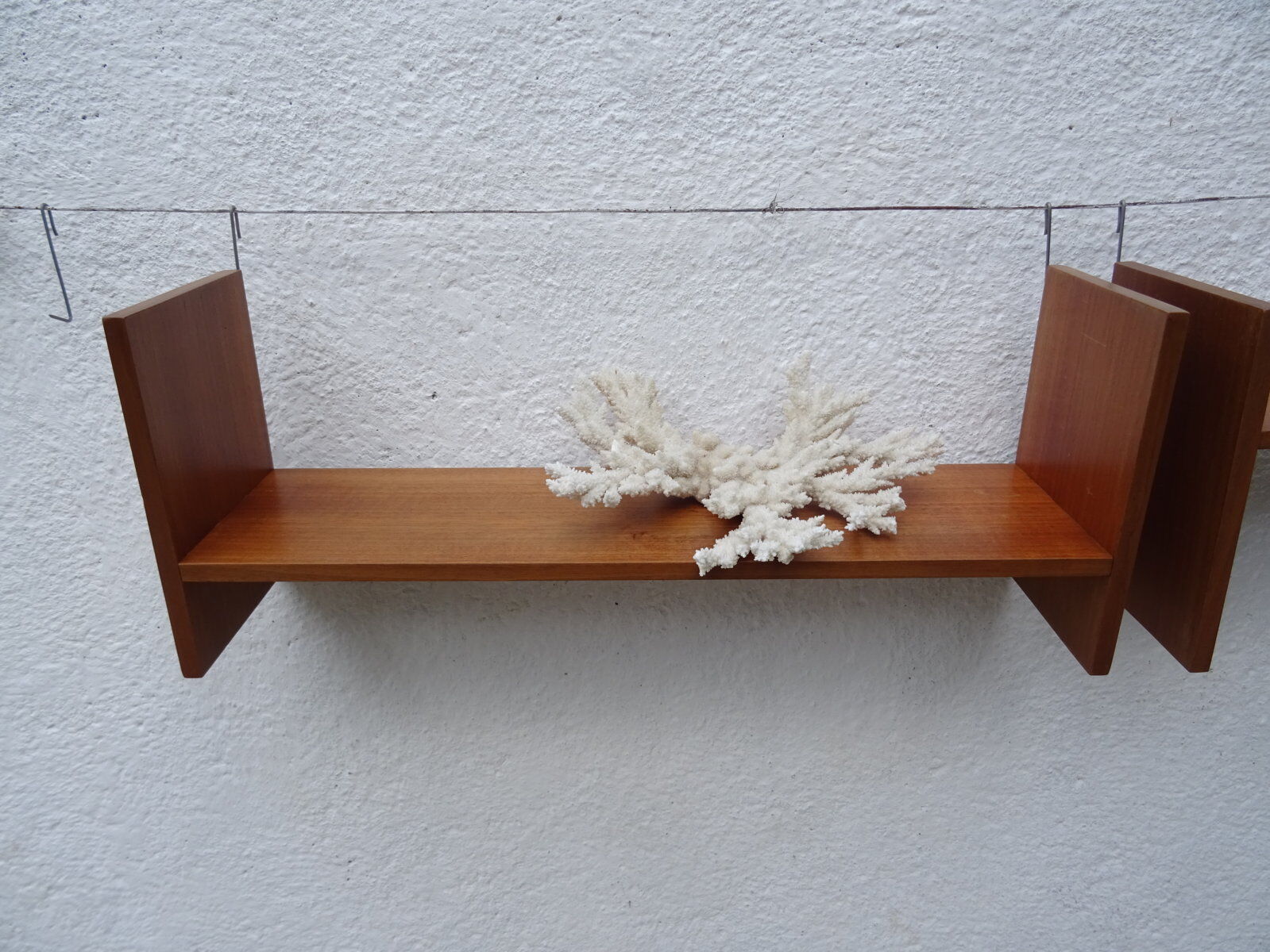 Pair of teak wall shelves