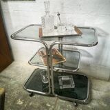 Chrome rolling table and smoked glass