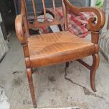 Mulched armchair of golden rye in solid walnut period Restoration around 1820