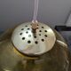 Old large and imposing thick glass globe with a bubbled amber colour, vintage.