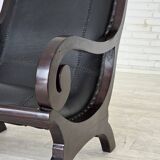 1970s, vintage armchair with footstool, black furniture leather.