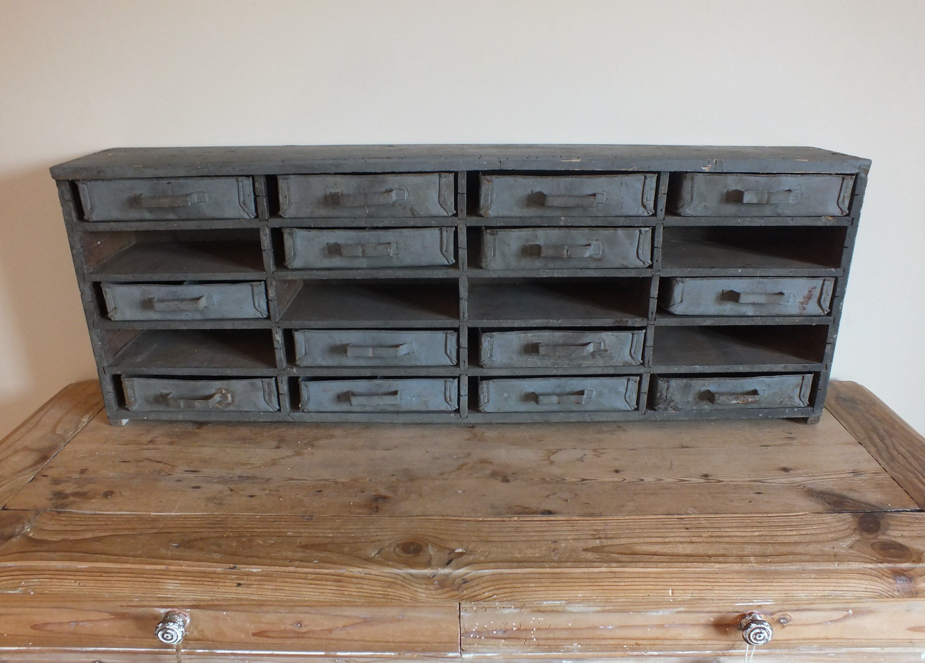 Garage or workshop furniture with drawers in cans
