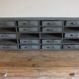 Garage or workshop furniture with drawers in cans