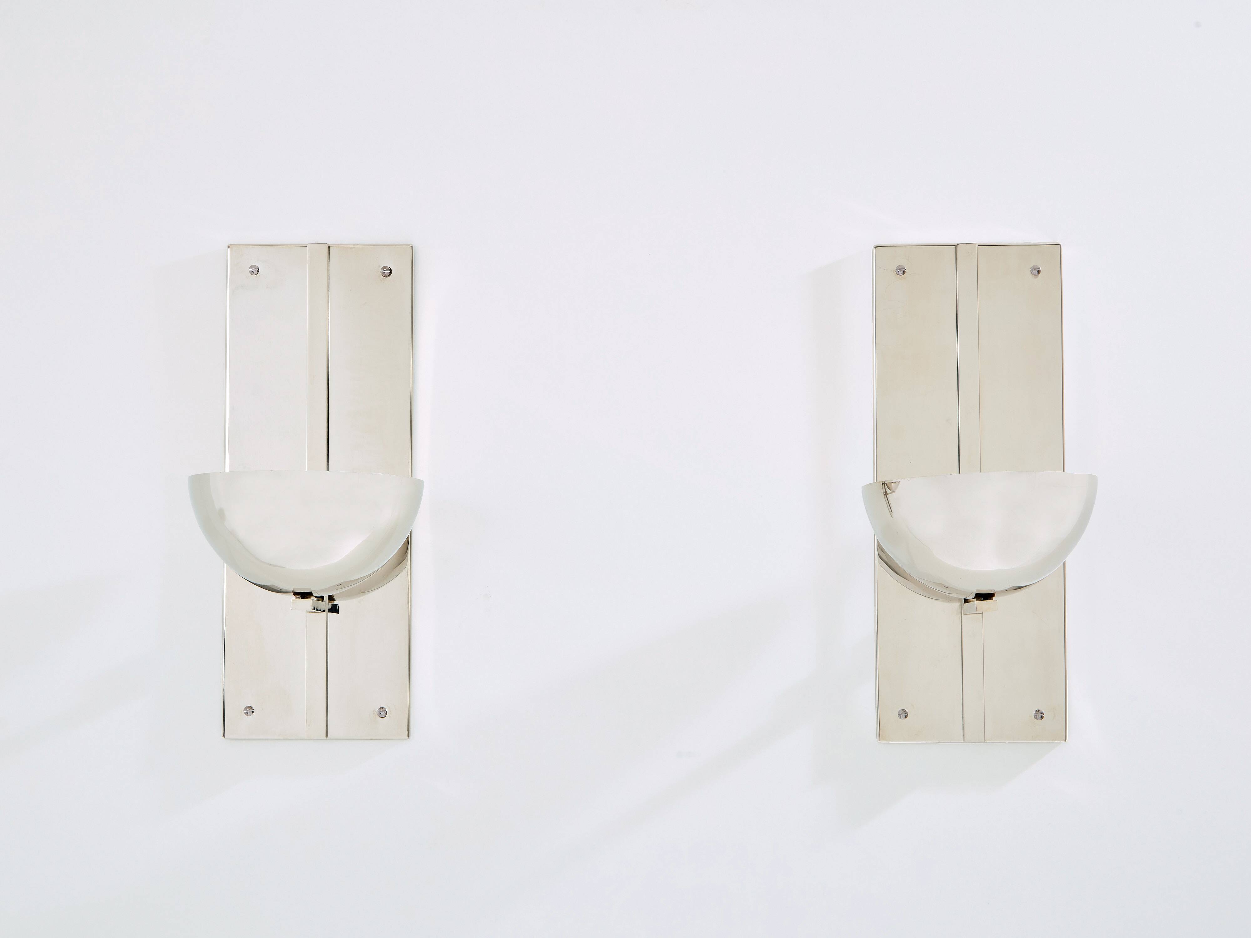 Pair of modernist wall lights by Claude Parent, nickel-plated steel, 1992.