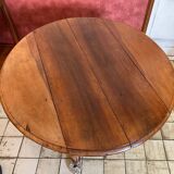 Folding round wooden table