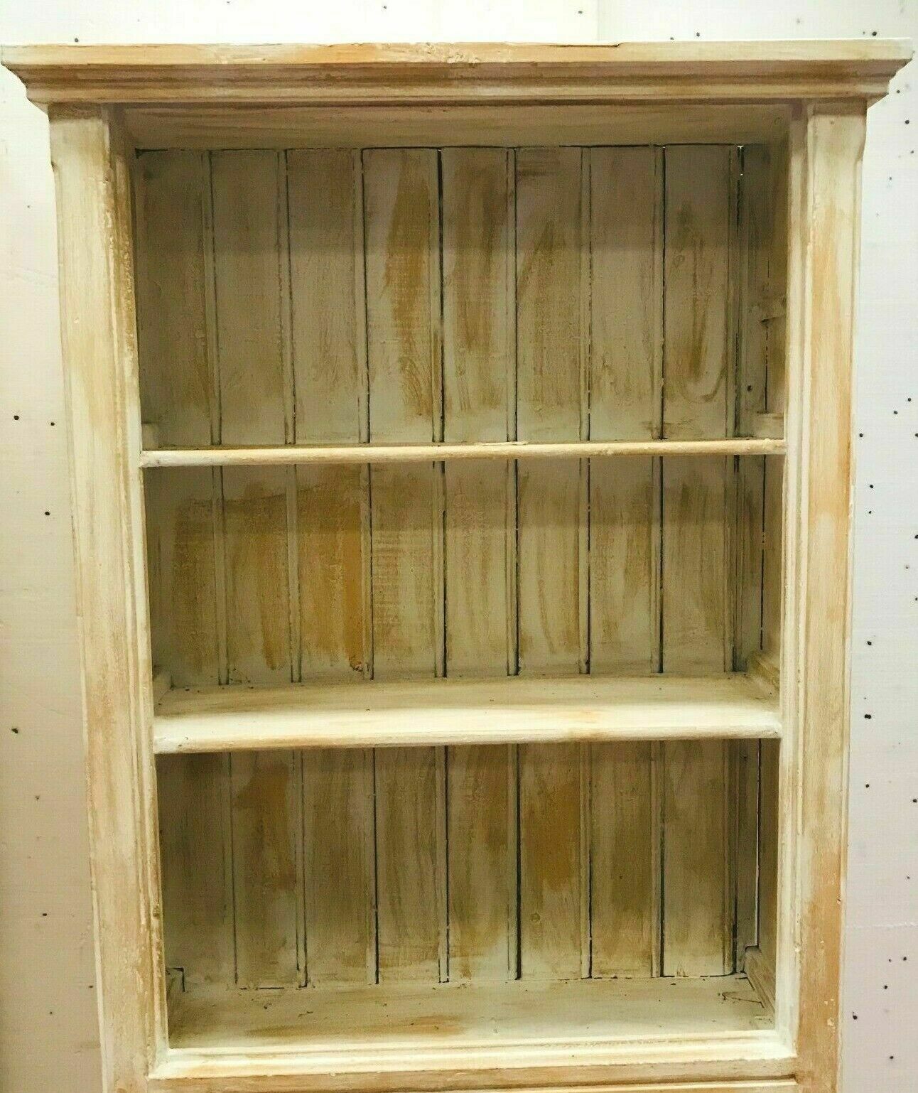Pair of store windows in patinated fir