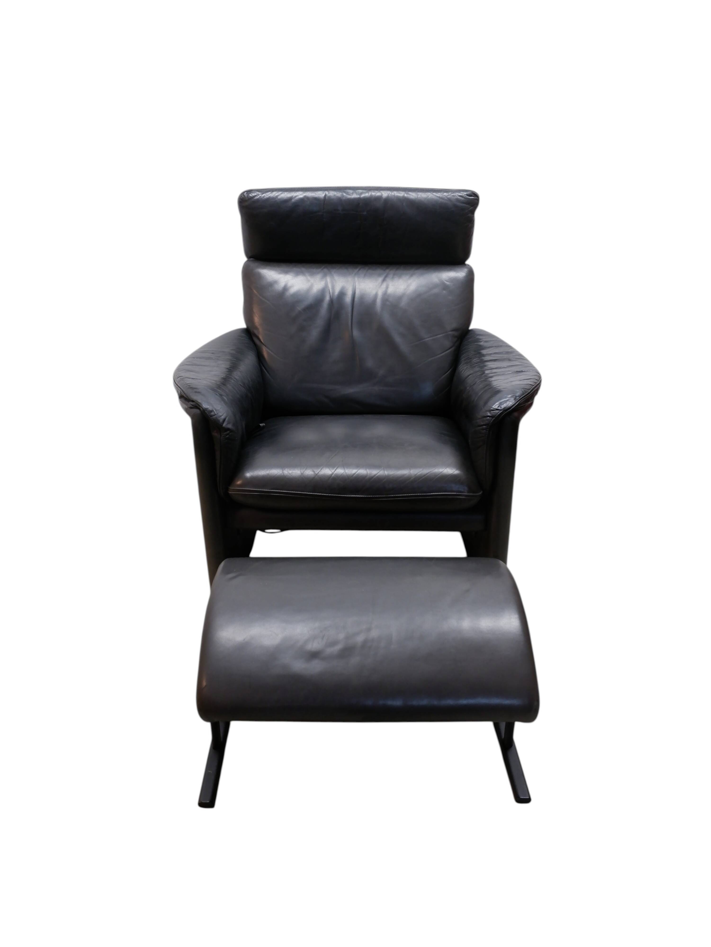 Fauteuil en cuir COR avec repose-pieds