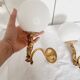 2 classic golden cherub wall lights and globe lampshades in perfect condition.