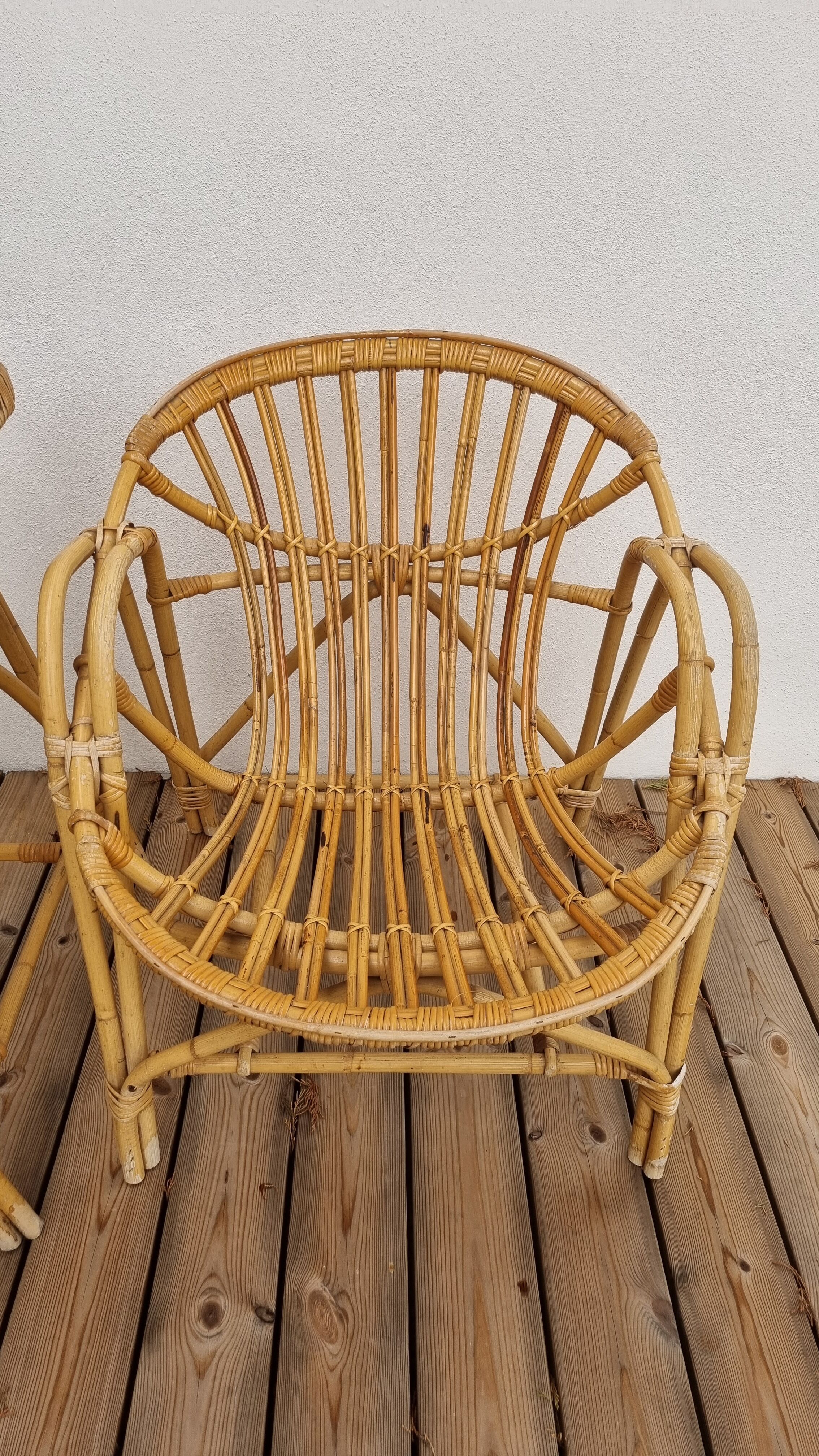 pair of Coquille rattan armchairs