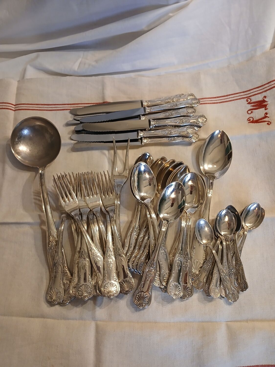 Antique flatware set for 51 place settings