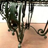 Round living room table in wrought iron and marble XX century