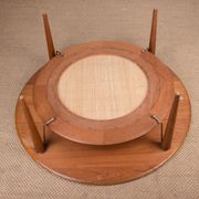 Round coffee table, two levels, danish in teak, brass and cannage