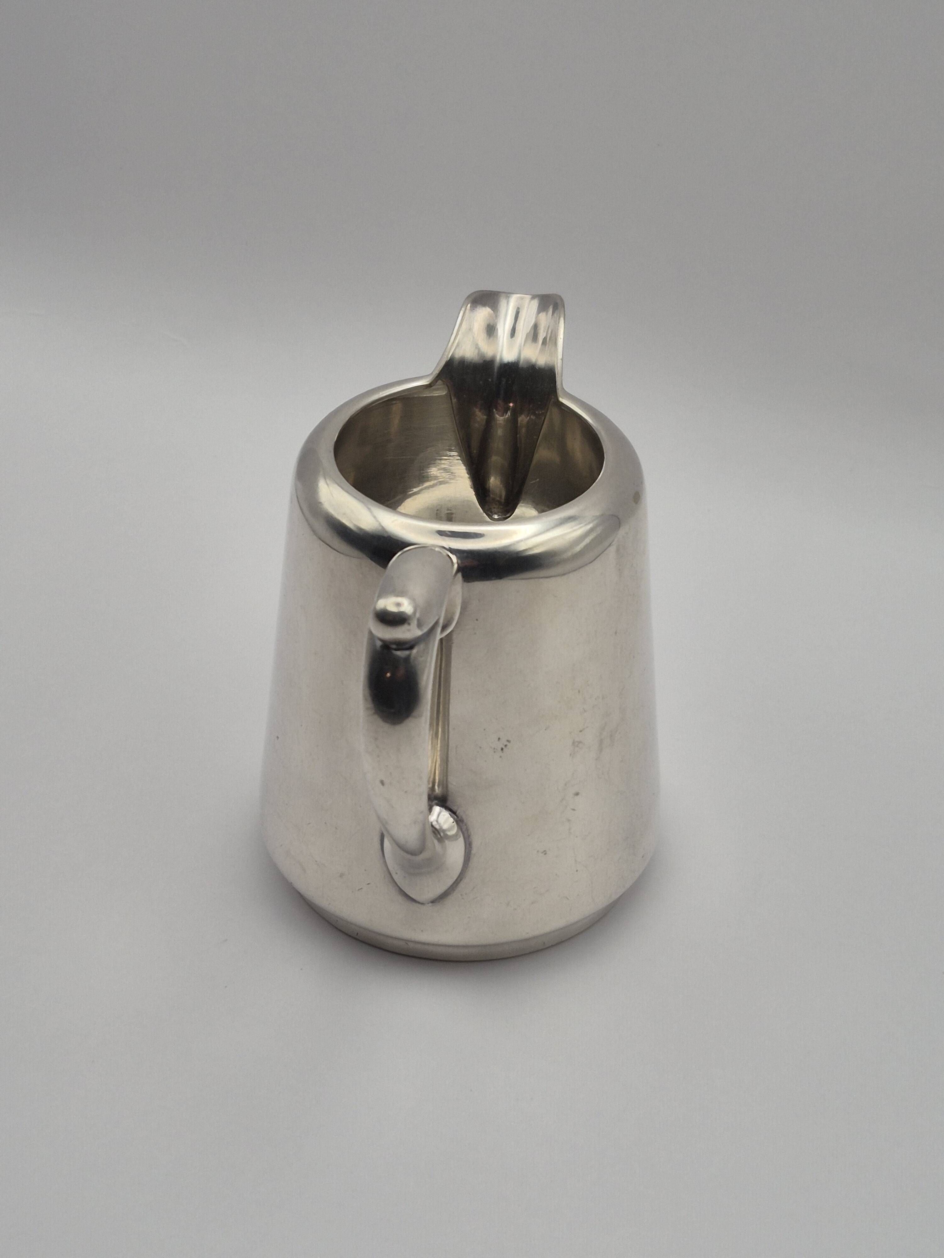 Superb vintage cream jug from the prestigious silversmithing house.