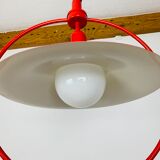Suspension Rolly rises and falls space age 70s red