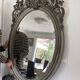 Miroir ovale biseaute  en bois et stuc