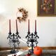 Black cast iron candlesticks, early 20th century, Neo-Rococo