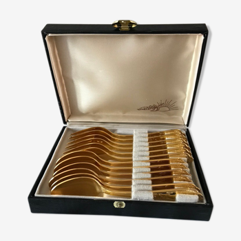 Edelstahl box with spoons and golden dessert forks