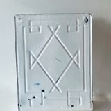 Old enamelled kitchen utensil display