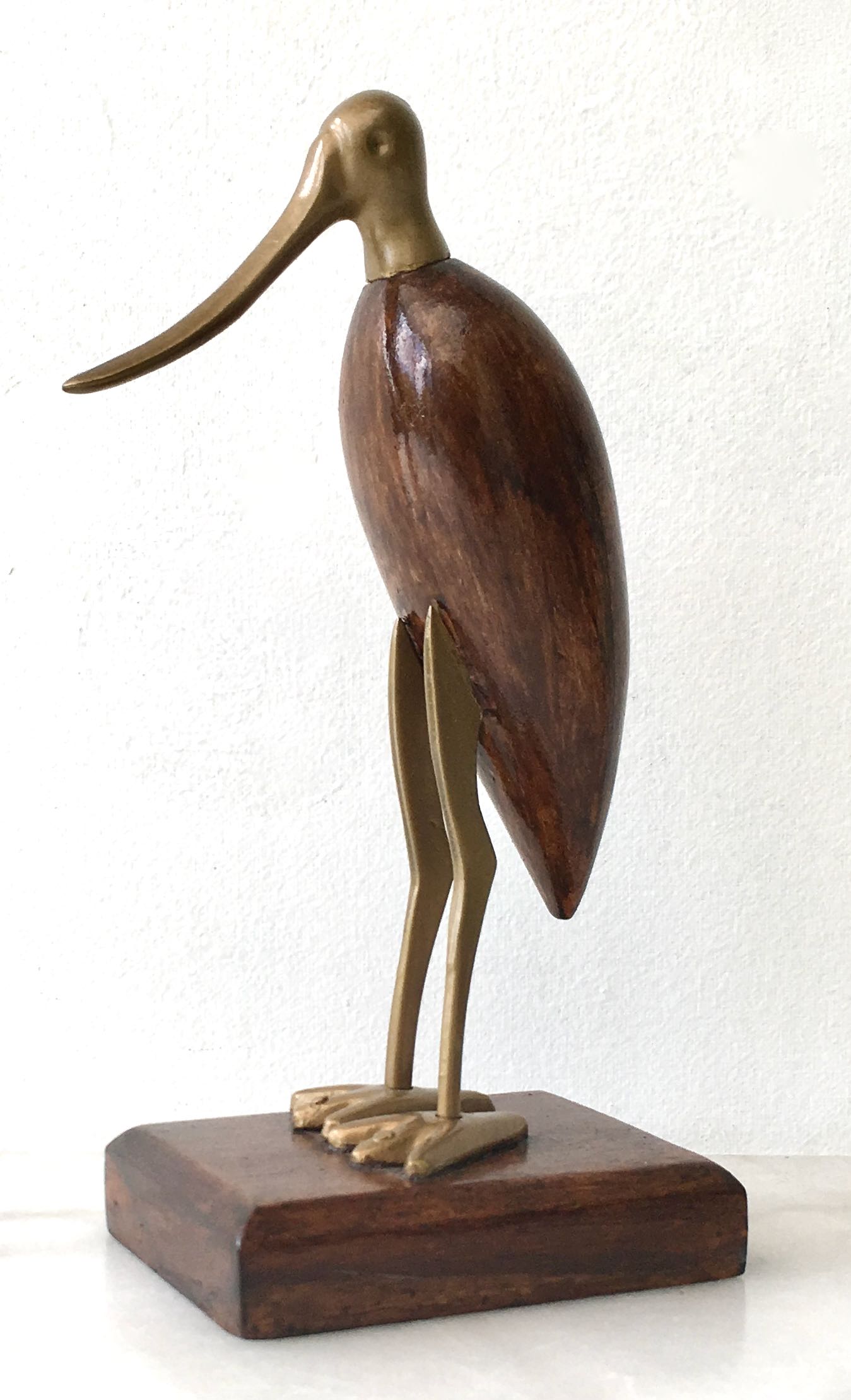 Animal marabout in teak and brass