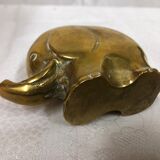 70s golden brass elephant paper press