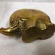 70s golden brass elephant paper press