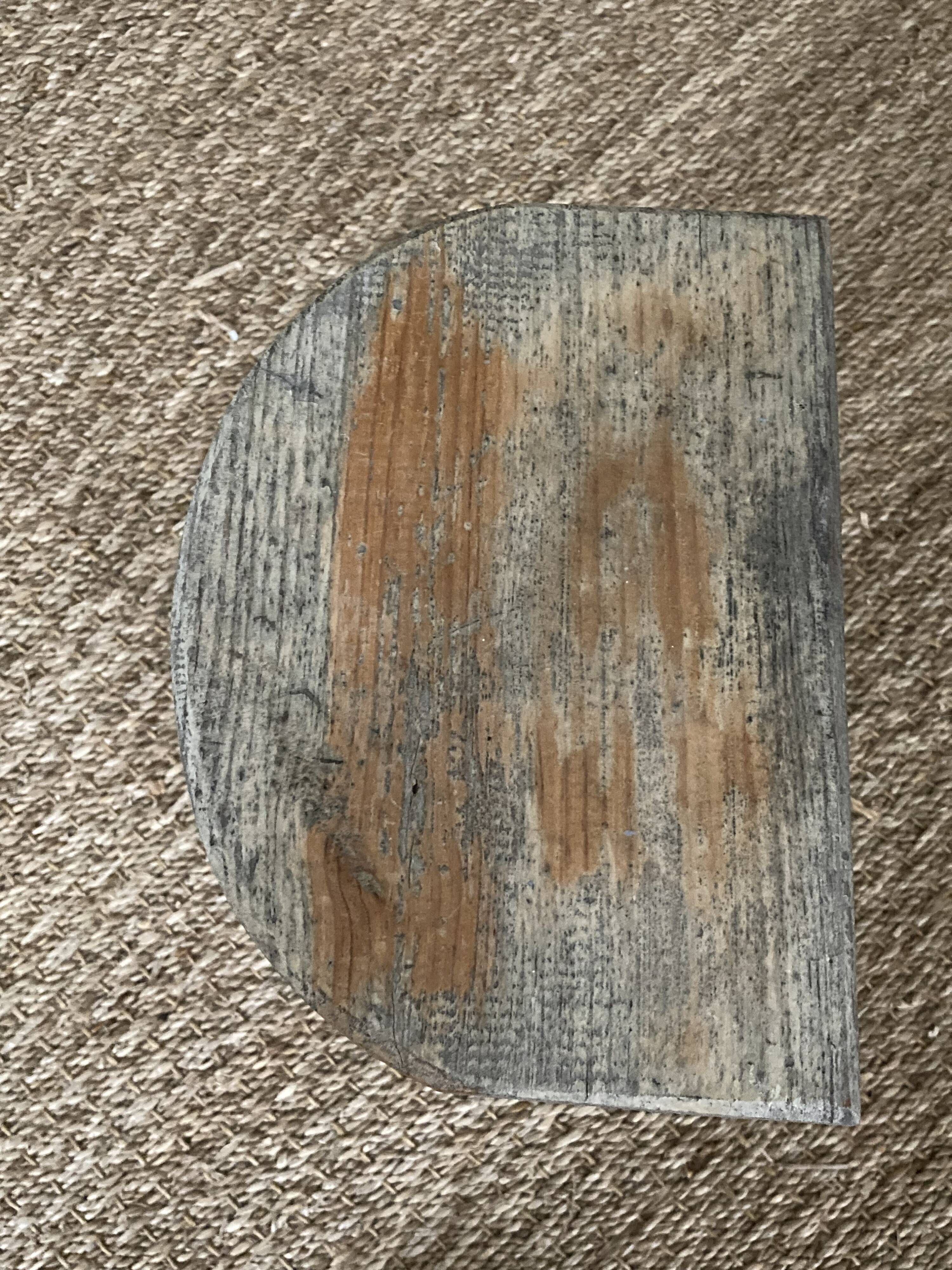 Antique brutalist wooden tripod stool