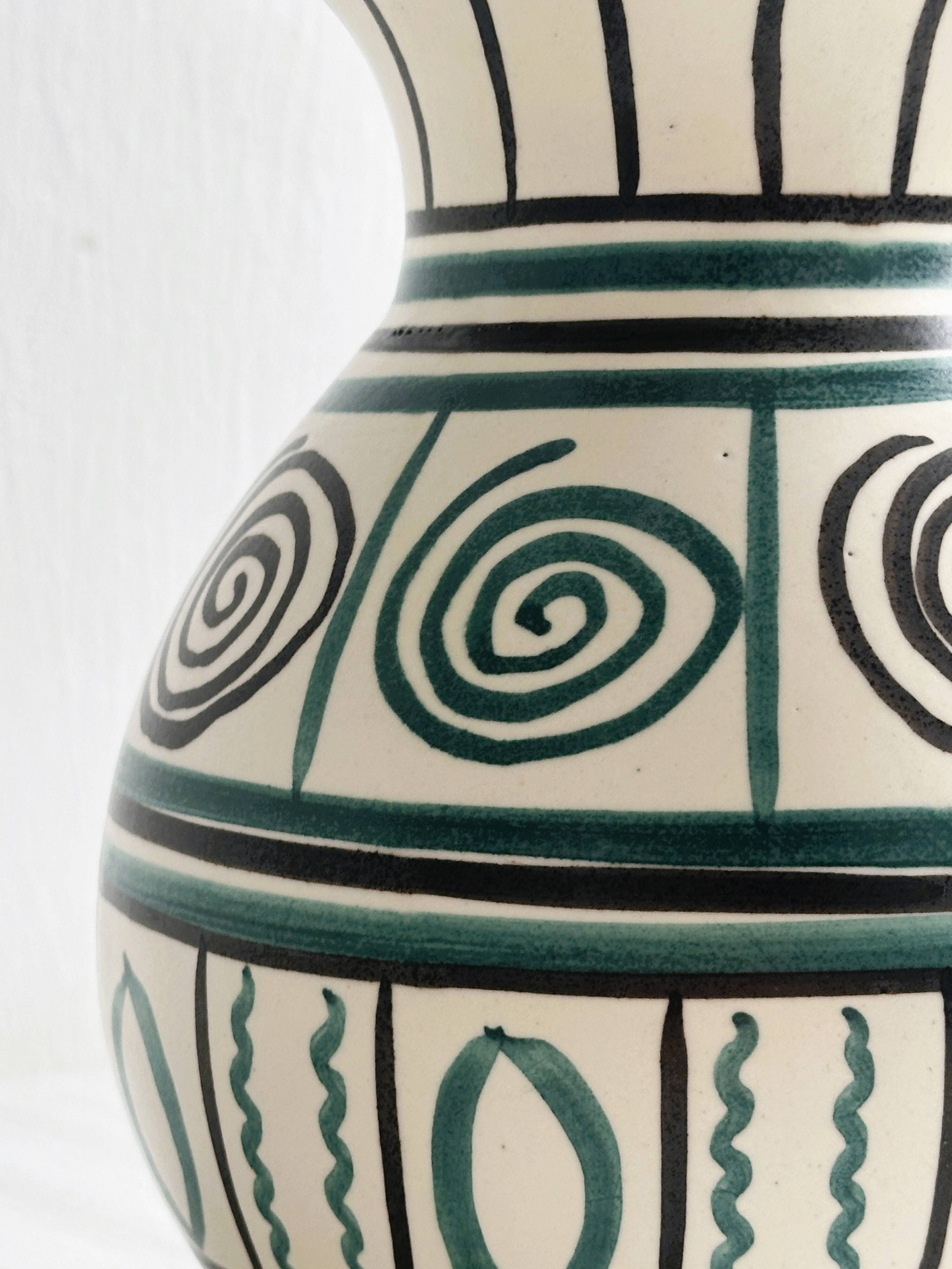 Old handmade ceramic vase, Punter style geometric ornaments.