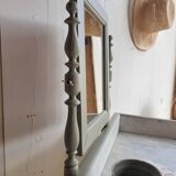 Antique wooden dressing table with marble top and mirror.