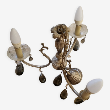 Metal chandelier and glass tassels