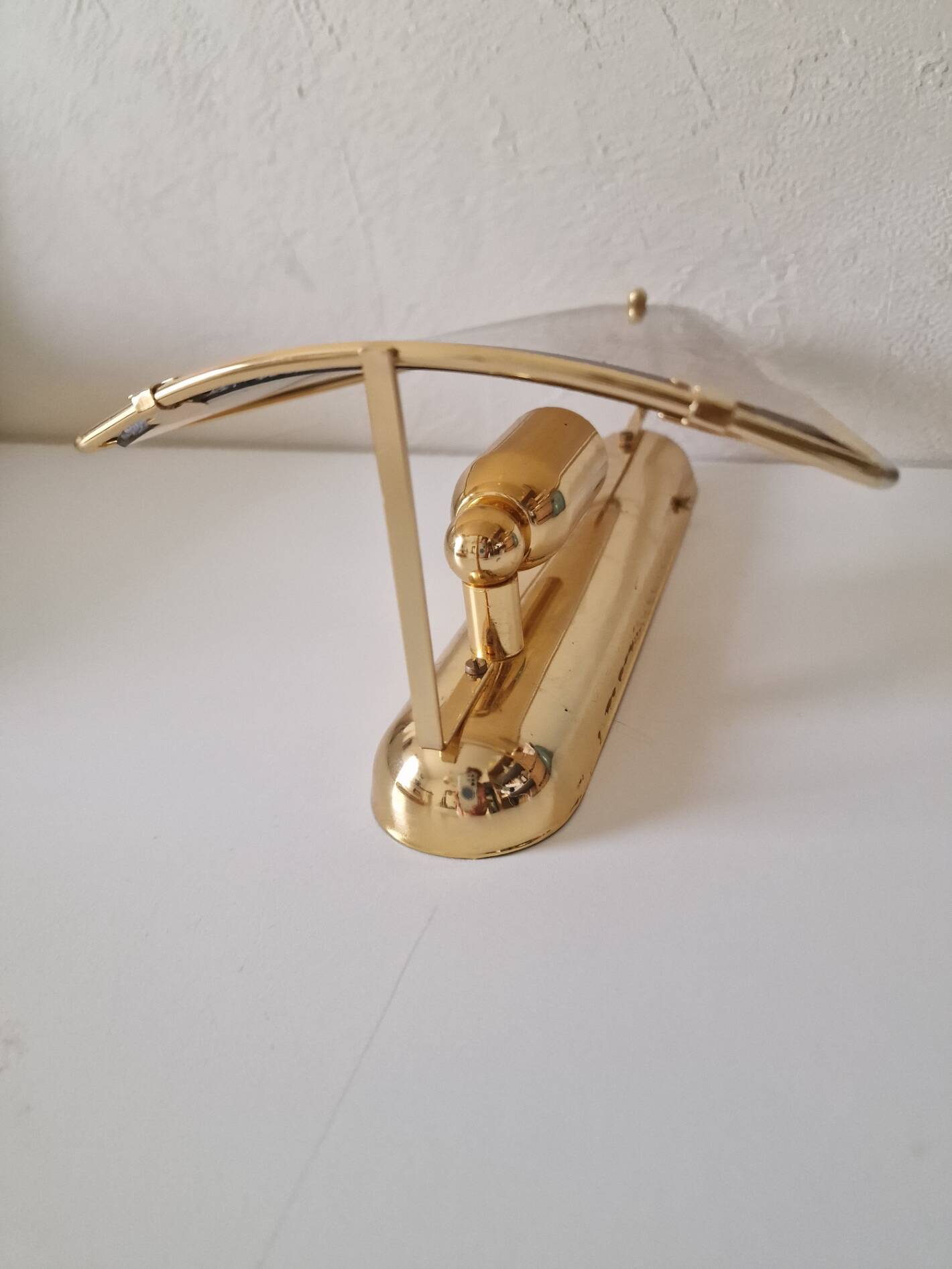 Pair of wall lights in brass and smoked glass by Lakro Amstelveen.