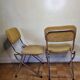 Pair of vintage folding chairs in gilded metal and 70s fabrics, restored
