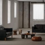 Three-seater canapé by Mogens Hansen, mid-century, in patinated black leather and solid beech.