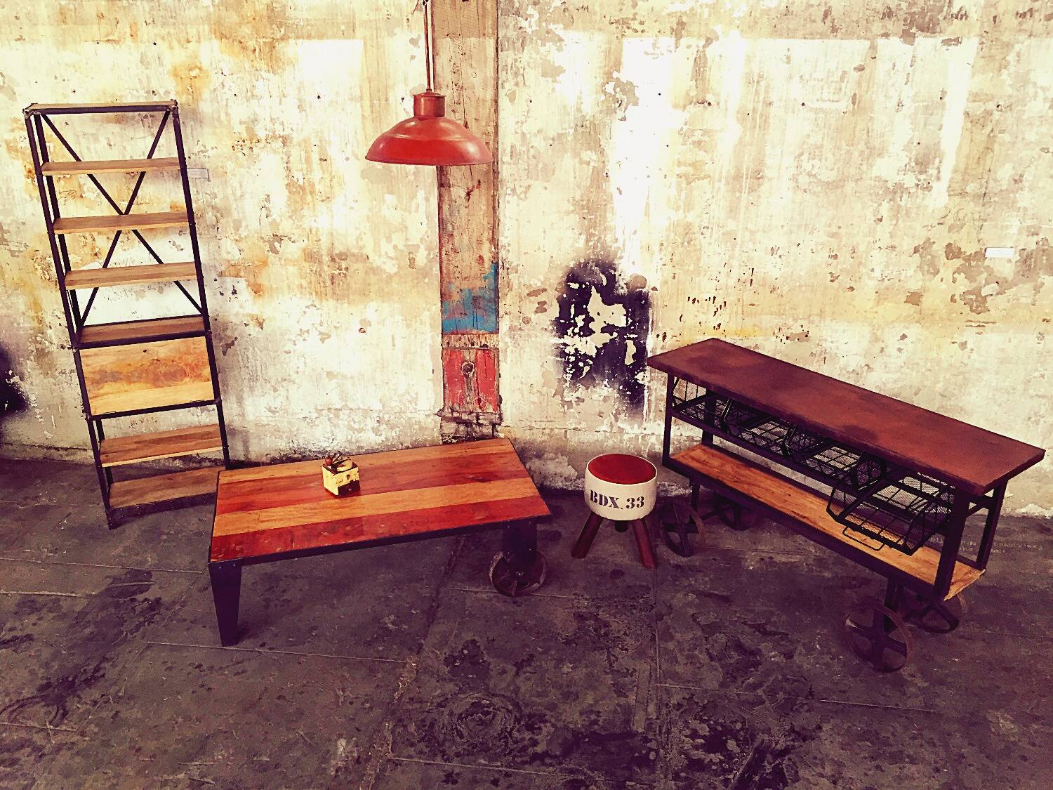 Industrial shelf made of solid exotic mango wood with riveted metal.