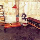 Industrial shelf made of solid exotic mango wood with riveted metal.