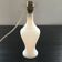Lamp base in white opaline.