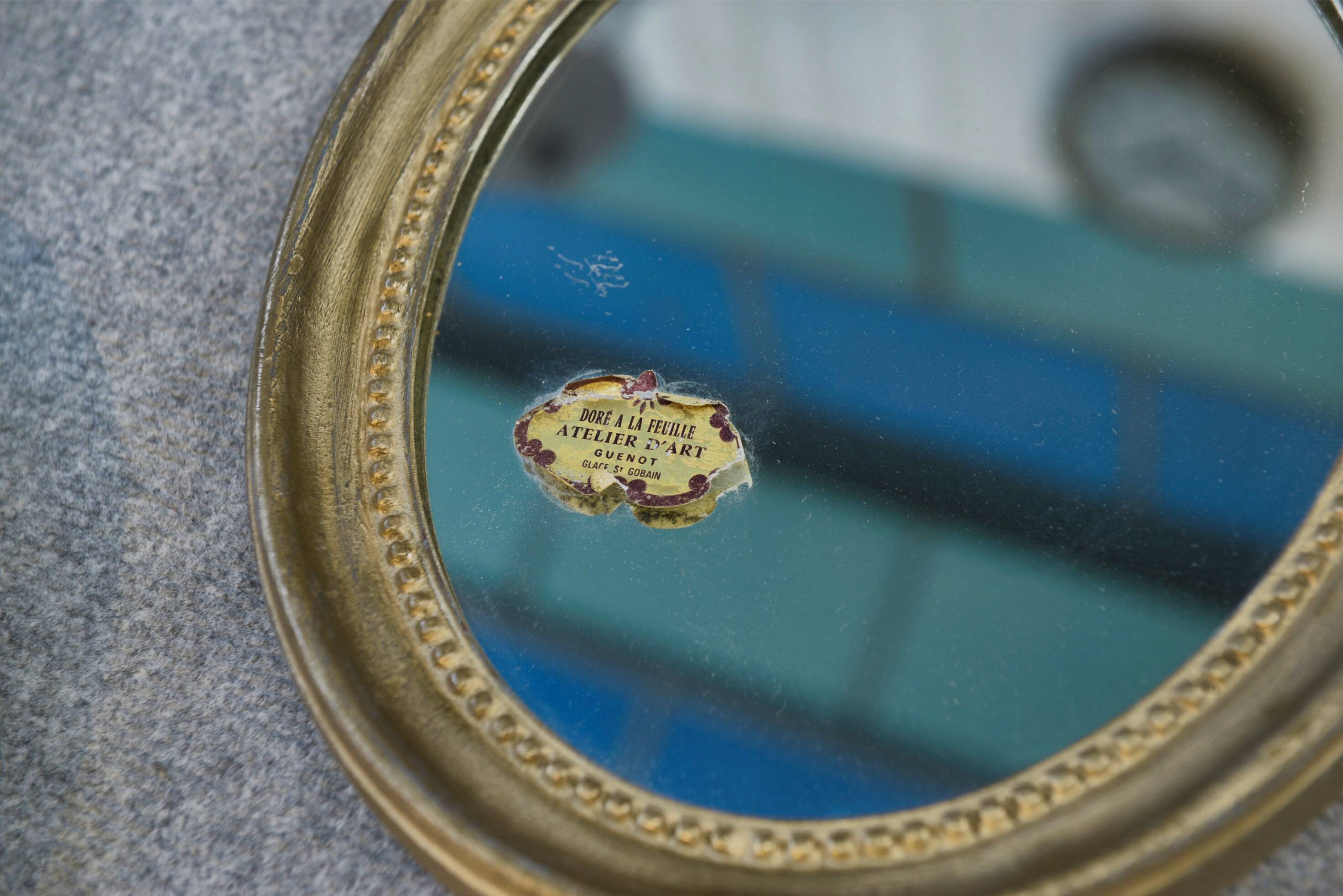 Paire de miroirs ovales, 1950