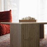 Vintage travertine coffee table, "Eye" model, by Rochebobois