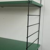 Wall shelf unit in blue from the 70s