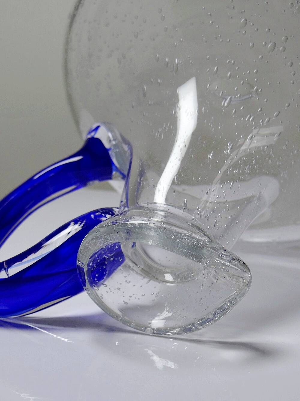 Bubble glass decanter with cobalt handle from Val de Pome Biot glassworks