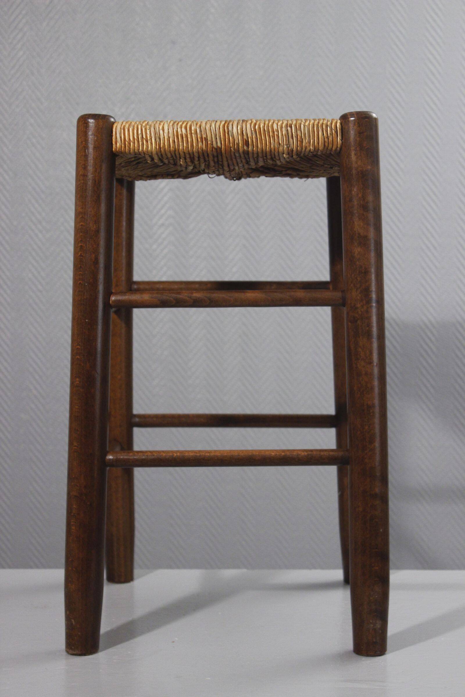 Vintage straw stool in the style of Charlotte Perriand, 1970s.