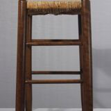 Vintage straw stool in the style of Charlotte Perriand, 1970s.