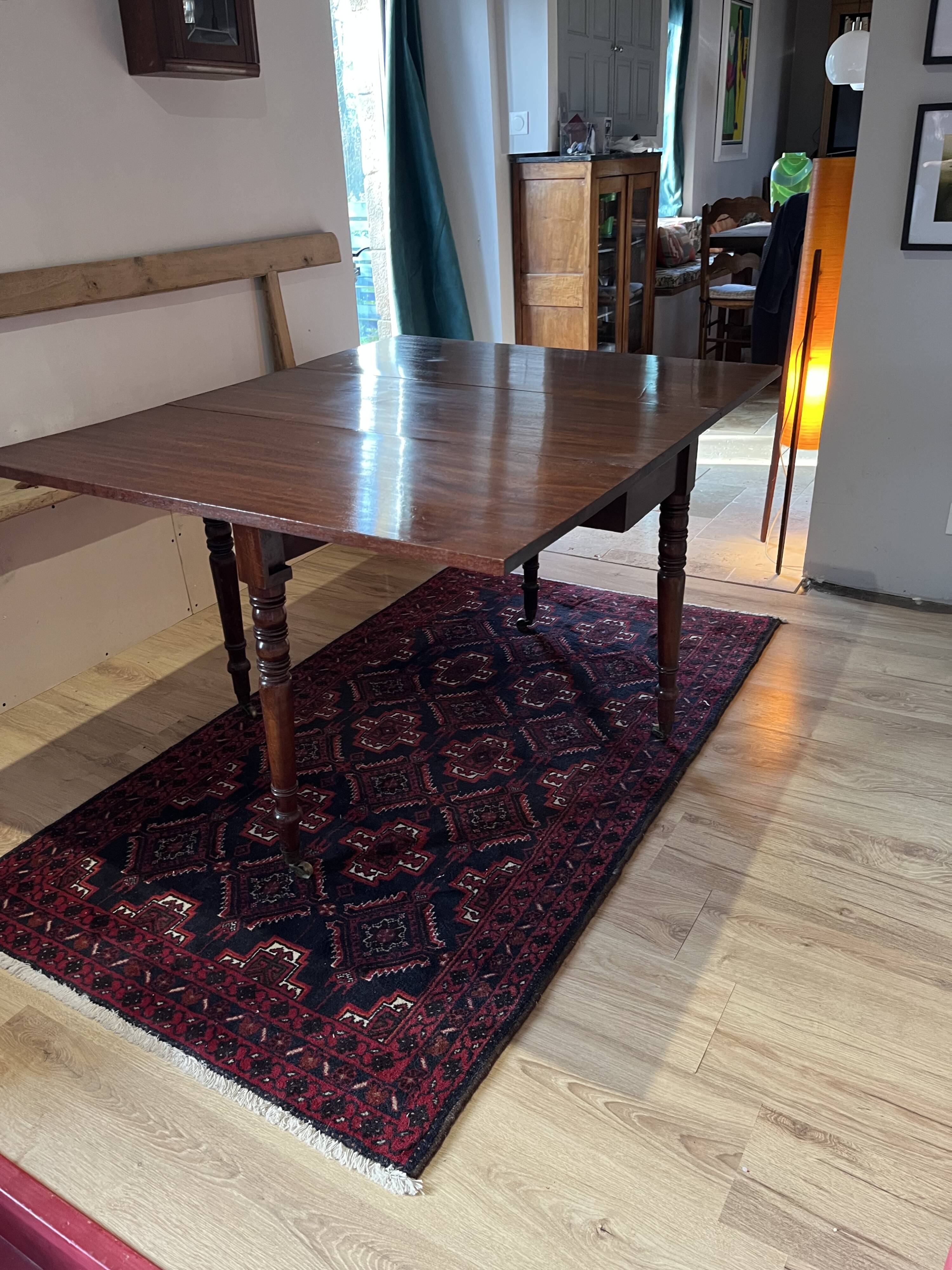 Vintage drop-leaf mahogany table; ideal for decorators.
